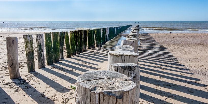 Breakwaters on the beach near Zoutelande by Jan Poppe