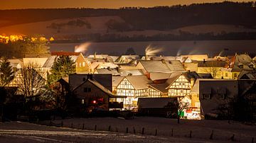 Winternacht in Herleshausen van Roland Brack