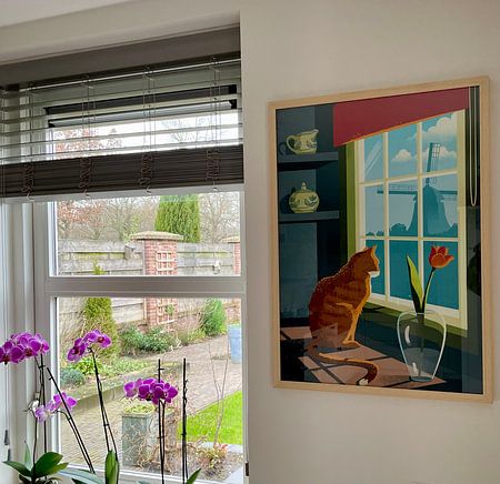 Orange Tabby Cat Looks Out of Window