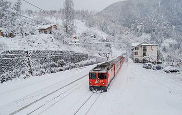 Train of the Rhaetian Railway at Filisur station by Kees van den Burg