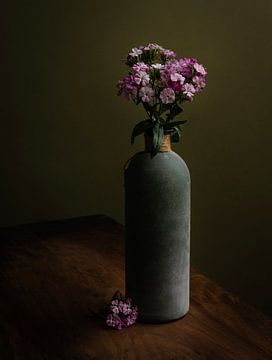 Pink flowers in a vase by Misty Melodies