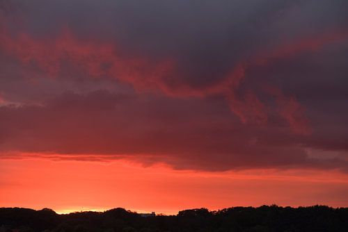A warm, red sunset by Peter Apers