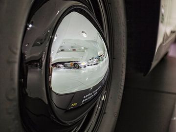 Reflection Porsche Museum in wheel cover Porsche 356 by Rob Boon