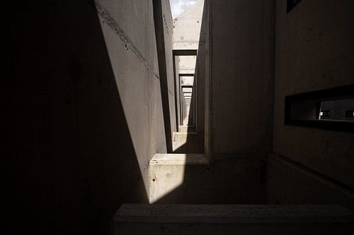 Concrete construction with repeating elements of light and shadow