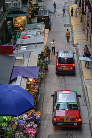Red taxi-'s near the flower market in Hong Kong