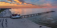 Pier on Ahlbeck beach at sunset