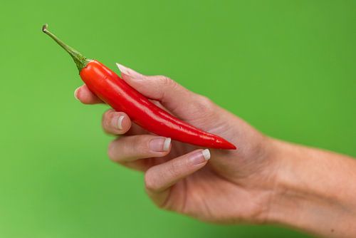 Rode peper, groene achtergrond van FotoSynthese