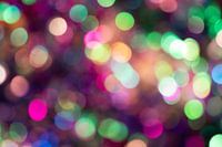 Bokeh coloré avec des lumières de fête comme fond de fête pour le réveillon du jour de l'an ou les a