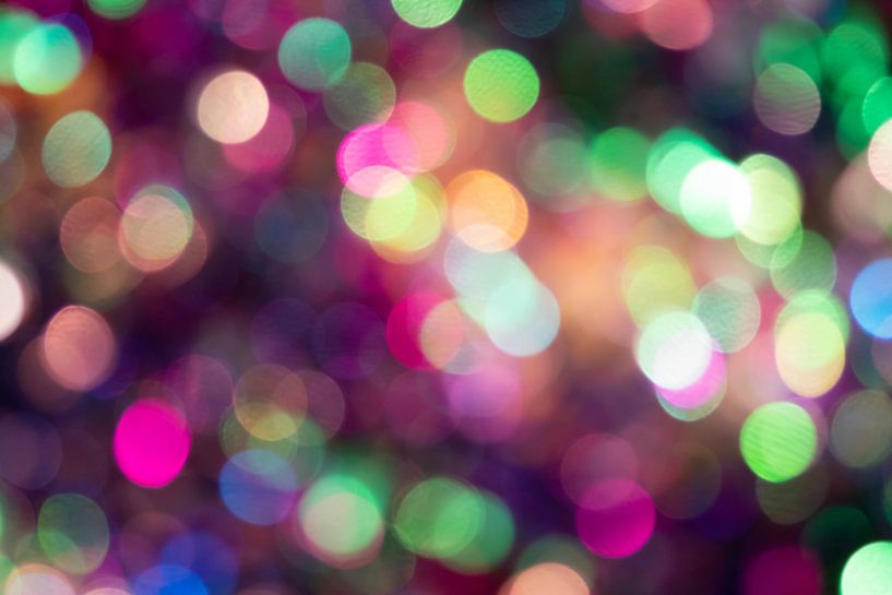 Colourful bokeh with party lights as a festive background for New Year's Eve or anniversaries by Your Happy Life