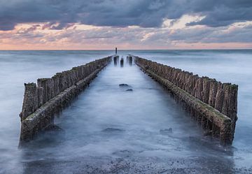 dark skies over the breakwater in Westkapelle by conny de visser