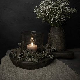 Atmospheric still life with candle in lantern and gypsophila by Mayra Fotografie