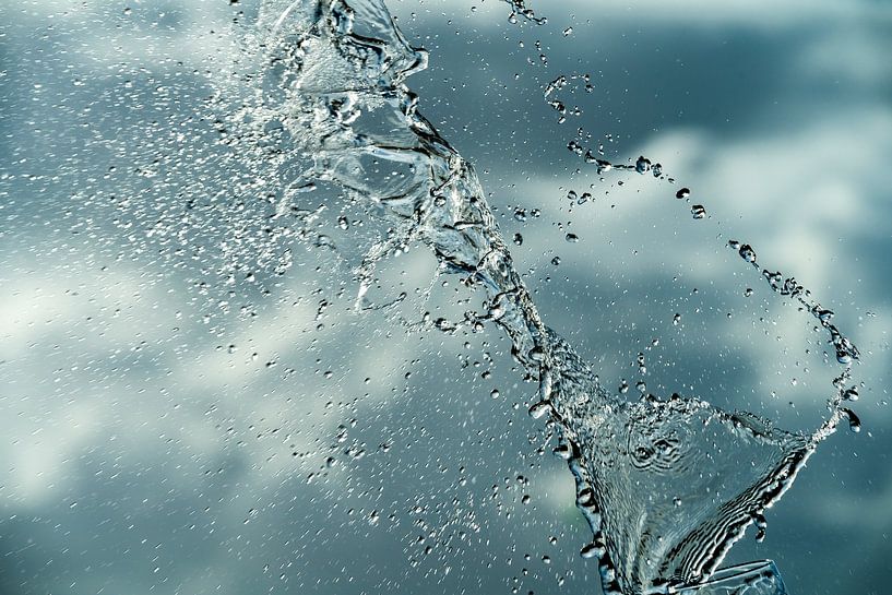 Water splashes in front of the clouds by Stephan Zaun