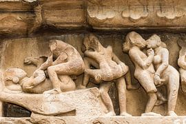 Khajurao - Erotic relief in the Lakshmana temple by Theo Molenaar