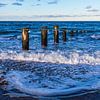 Wellen und Buhne am Strand der Ostsee in Heiligendamm von Rico Ködder