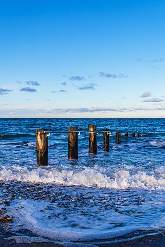 Waves and groyne on the Baltic Sea beach in Heiligendamm by Rico Ködder