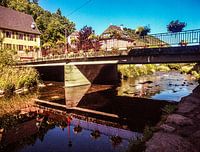 Bridge over the Thür (Vosges) with retro colours like a vintage postcard