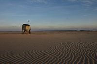 Ertrinkendes Haus bei Sonnenaufgang