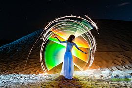 Girls in the sand II by Bert Baldauf