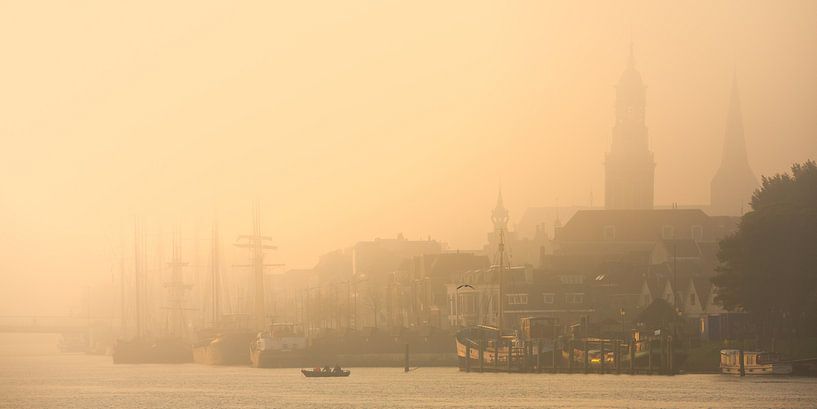 City front of Kampen in the fog. by Evert Jan Kip
