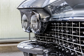 Chrome front of a classic car by Troy Wegman
