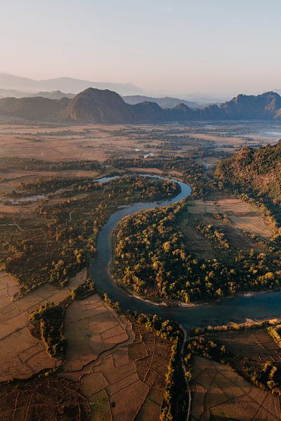 River with mountains in the background from hot air balloon in Laos by Yvette Baur