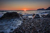 Sunset on the beach of Agios Gordios, Corfu