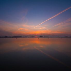 Uitzicht strand met zonsondergang by Rouzbeh Tahmassian