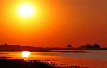 Sunset in Botswana van W. Woyke