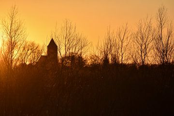 Sunset, church tower Zalk along the IJssel river by Carmen Nijenhuis