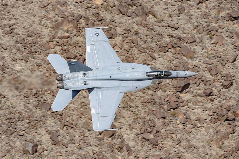 Low-flying U.S. Navy Boeing F/A-18E Super Hornet. by Jaap van den Berg