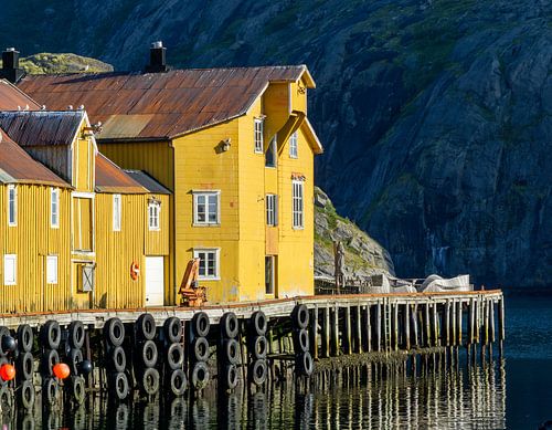 Wooden houses on the quay in port Nusfjord