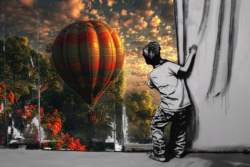 Jongen reikt naar kleurrijke luchtballon