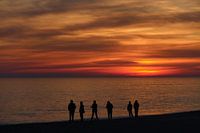 people at the Algarve beach after sunset, Portugal