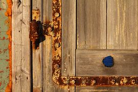 Old wooden door by Erick van Bommel