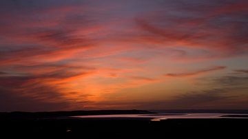 Zonsondergang met rode lucht - Texel van Barbara Brolsma