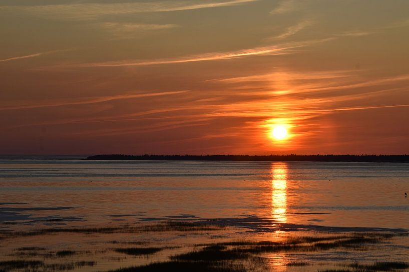 Un coucher de soleil sur le fleuve Saint laurent par Claude Laprise