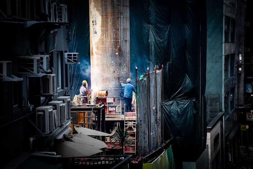 Ouvriers de construction au travail dans un éclairage parfait par Marlies Gerritsen Photography