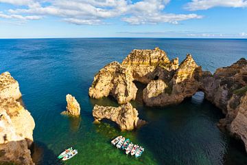 Boats near Ponta da Piedade at Algarve in Portugal by Werner Dieterich