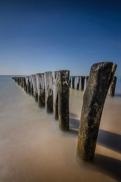 The atmosphere of the pile heads in Zoutelande. by Robby's fotografie