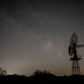 An American windmill against a sparkling starry sky by Hillebrand Breuker