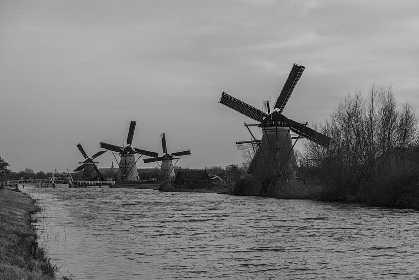 Zwart witte foto van molens bij Kinderdijk. van Hartsema fotografie