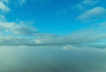 Euromast Rotterdam in the fog by Ilya Korzelius
