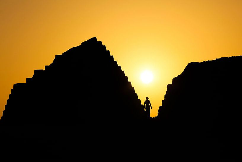 Sihouette between pyramids in Sudan by Krijn van der Giessen