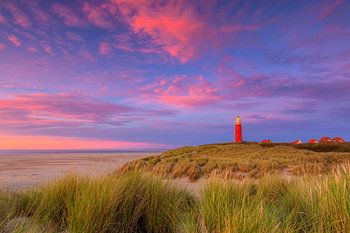 Lighthouse on Wadden island Texel and a beautiful afterglow in the sky