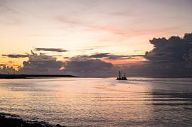 Wadden Sea sunset with cutter by Jan Georg Meijer
