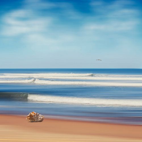 Tranquil sea view with seagull and stone block by Dirk Wüstenhagen