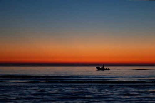 Zonsondergang aan zee van Eus Driessen