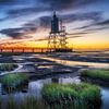Stilte aan de Waddenzee – De vuurtoren van Obereversand bij zonsondergang van Steffen Peters