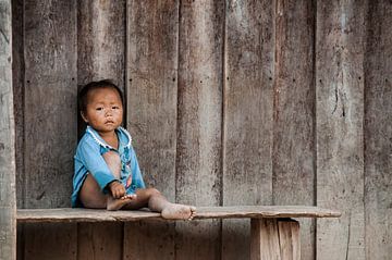 Verträumtes Kind in Laos