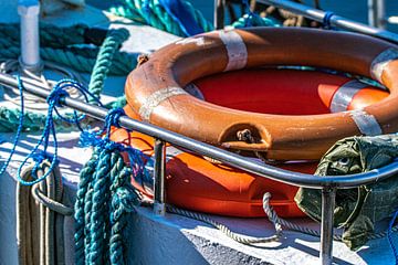 Lifebelt on fishing boat by Kai Müller